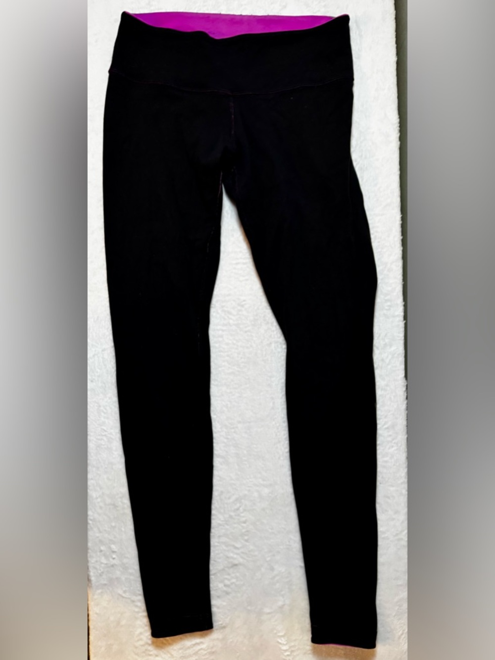 Lululemon Medium Black Thick Leggings with pink inside and small logo on leg